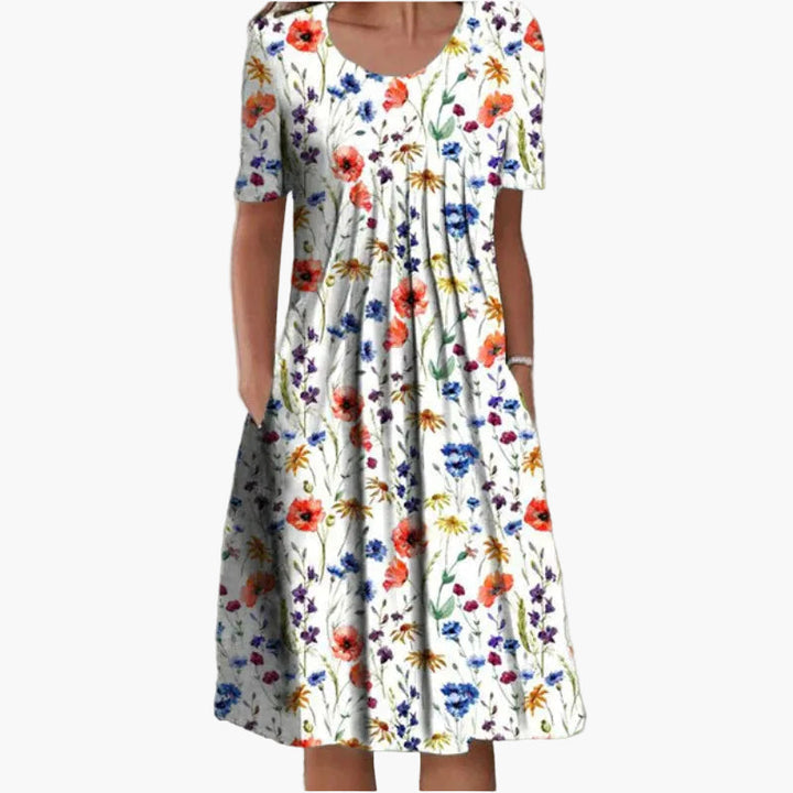 Elegantes Damen Sommerkleid mit Blumenmuster, ideal als leichtes Freizeit- und Urlaubskleid. Langes, luftiges Design.