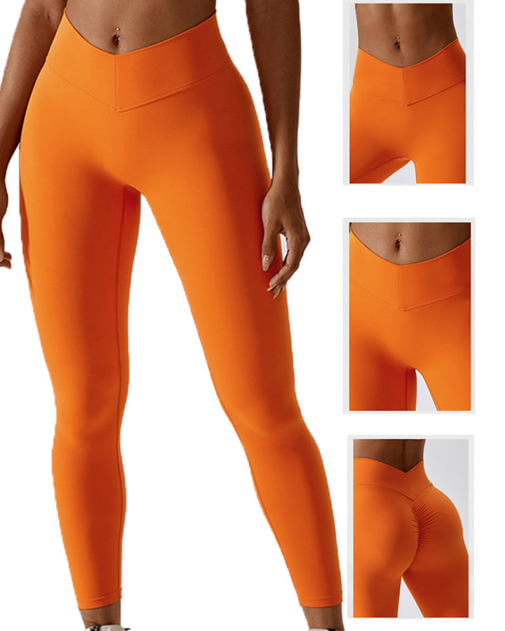 Figurbetonte Damen Sporthose in Weiß-Orange, ideal für Workout & Freizeit. Dehnbarer Stoff.
