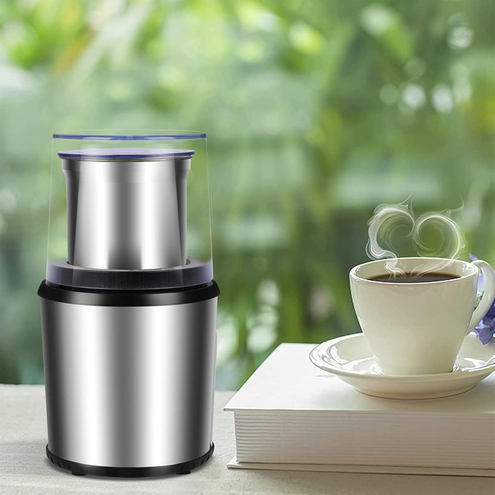 Elektrische Gewürzmühle mit abnehmbarem Edelstahlbecher für einfache Reinigung. Ideal für Kaffee & frische Gewürze.