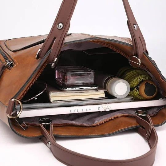 Geräumige PU-Leder Crossbody Tasche für Damen, in Braun, mit mehreren Fächern zur Organisation.