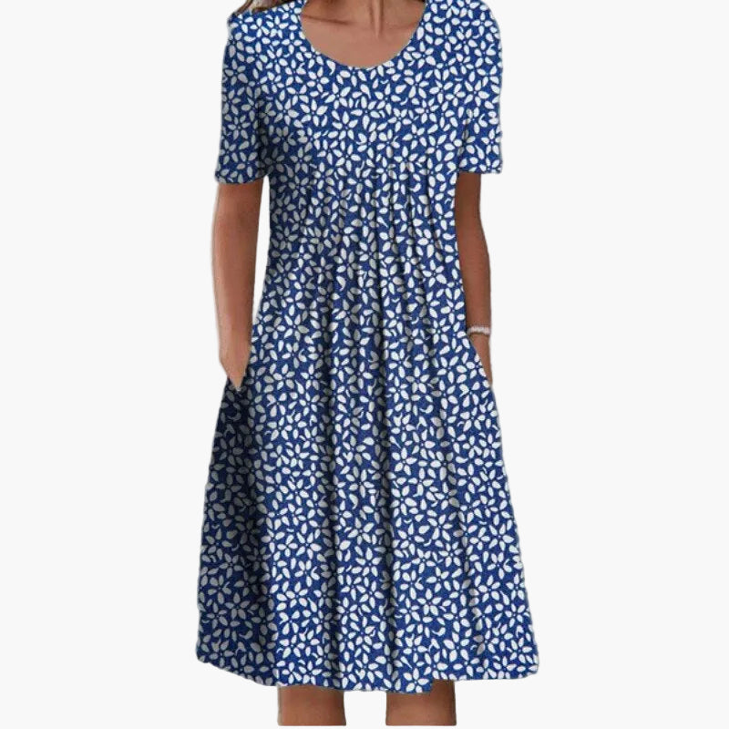 Luftiges Damenkleid mit farbenfrohem Blumenmuster. Ein elegantes langes Sommerkleid für Freizeit, Urlaub und Alltag.