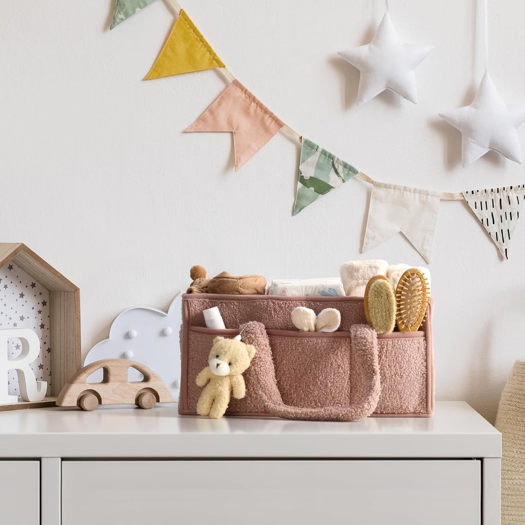 Kompakter Plüsch Windel-Organizer mit Fächern, perfekt für kleine Babyzimmer.