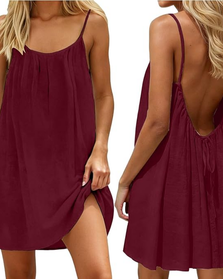 Schickes Damen Sommerkleid mit offenem Rücken und Spaghettiträgern, feminin und luftig für heiße Tage.