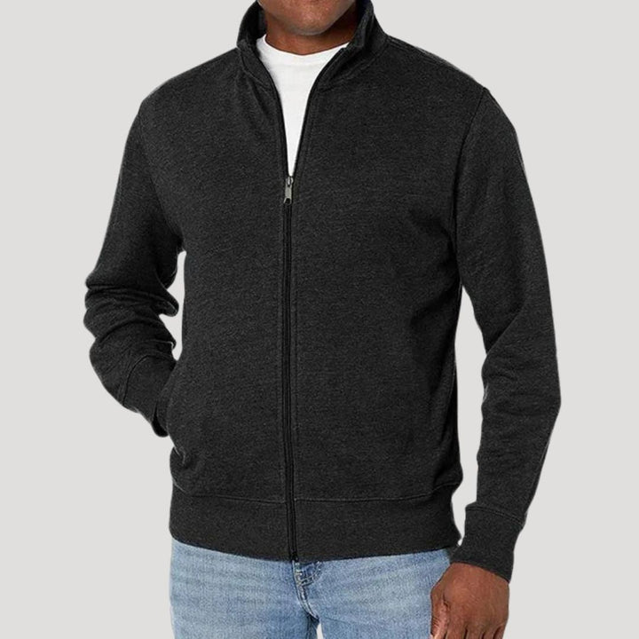 Detailansicht des robusten Reißverschlusses der Herren Übergangsjacke für einfachen Komfort und Stil.
