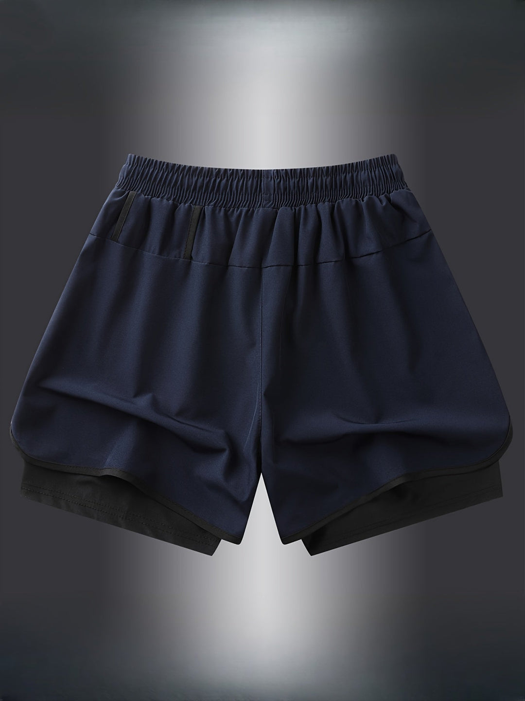 Reflektierende Herren Laufshorts 2-in-1, für sicheres Training bei Dunkelheit. Komfortable Passform & Taschen.