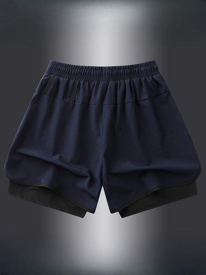 Reflektierende Herren Laufshorts 2-in-1, für sicheres Training bei Dunkelheit. Komfortable Passform & Taschen.