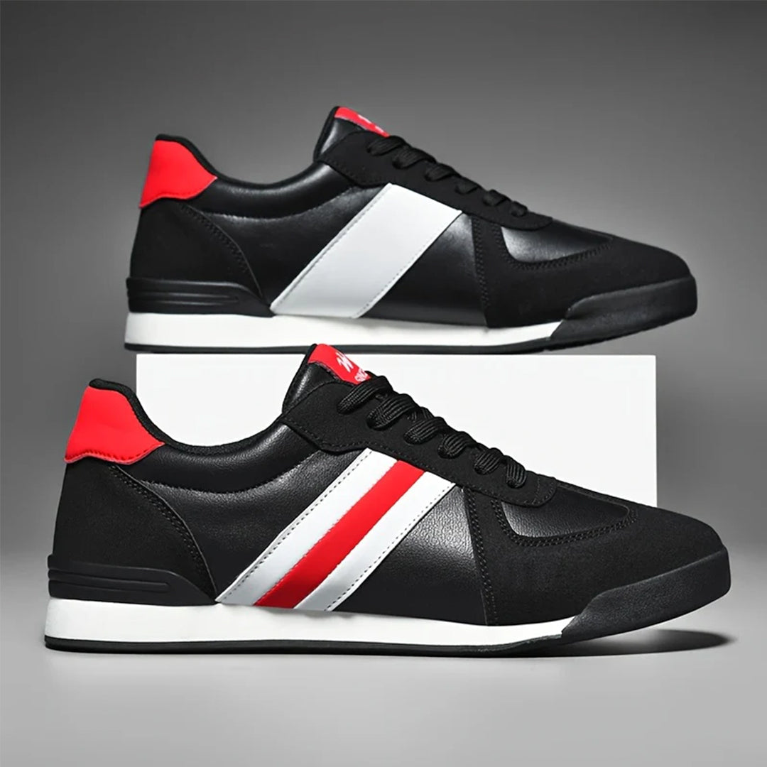 Herren-Sneaker von vorne, betonen die bequeme Passform & das modische Streifen-Design für Alltagsschuhe.