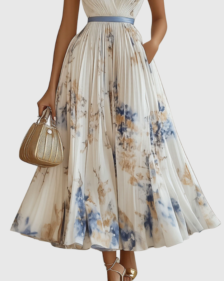 Modisches Damen Plissee Midi Kleid mit Blumenmuster. Ärmellos, ideal als Sommerkleid.