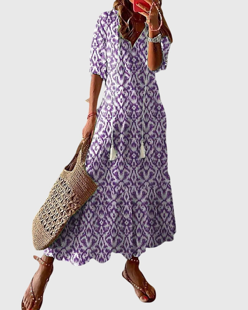 Elegantes Damen Freizeitkleid, A-Linie, Vintage Blumenmuster & V-Ausschnitt. Ein leichtes Sommerkleid.