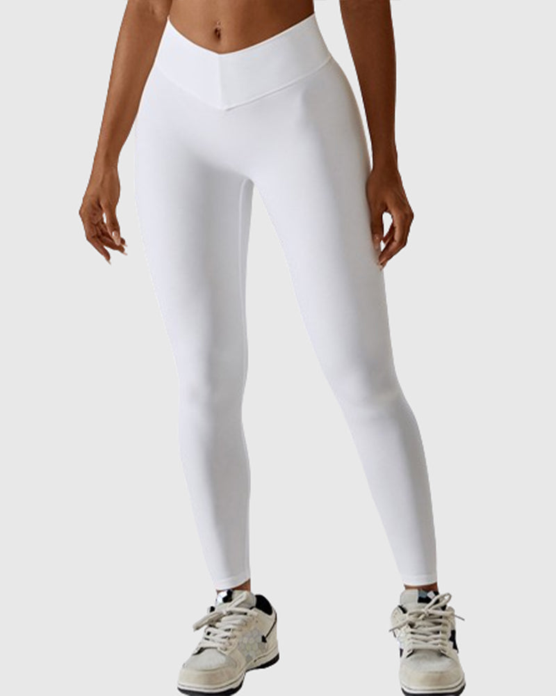 Elegante weiße Damen Yogahose mit hohem Bund. Komfortable Leggings für Fitness & Entspannung.