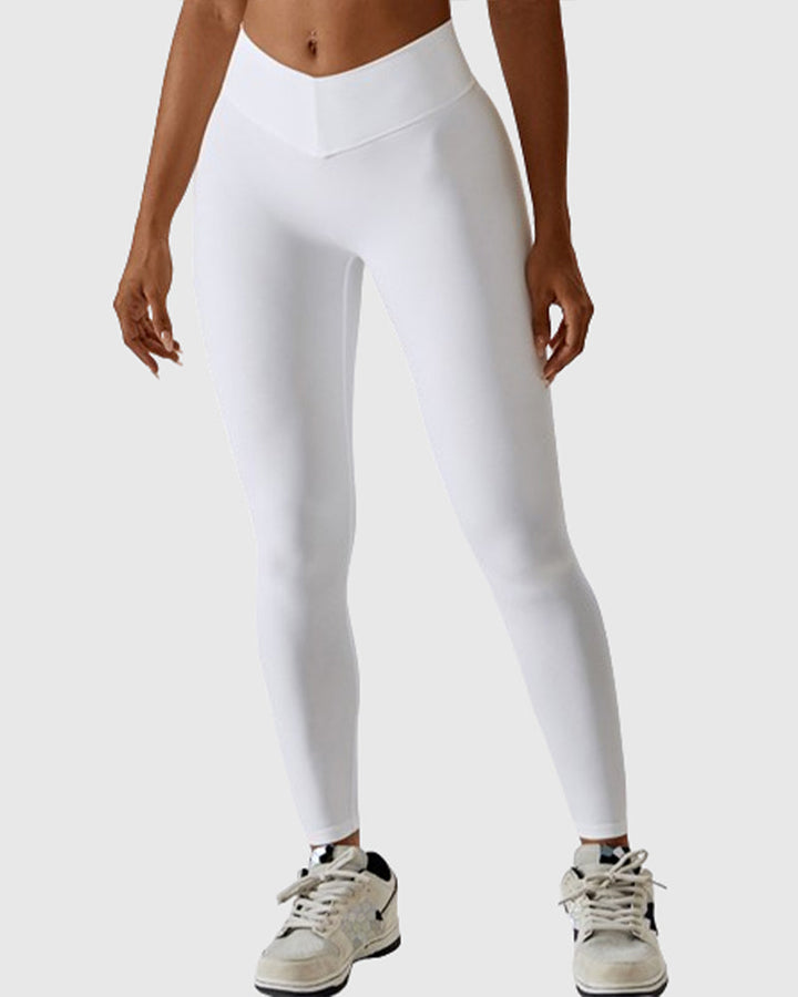 Elegante weiße Damen Yogahose mit hohem Bund. Komfortable Leggings für Fitness & Entspannung.
