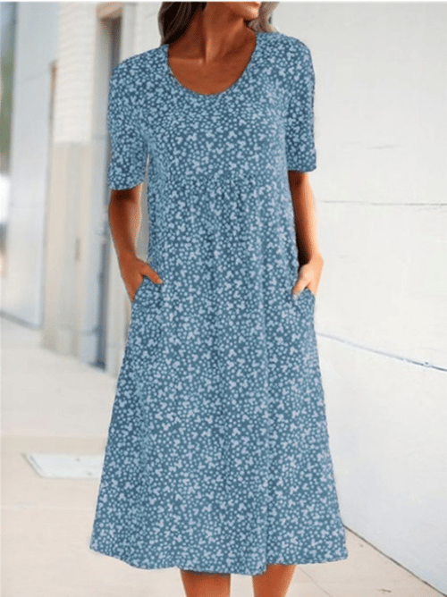 Leichtes Damen Sommerkleid mit Blumenmuster, Rundhals, perfekt für stilvolle Sommertage.