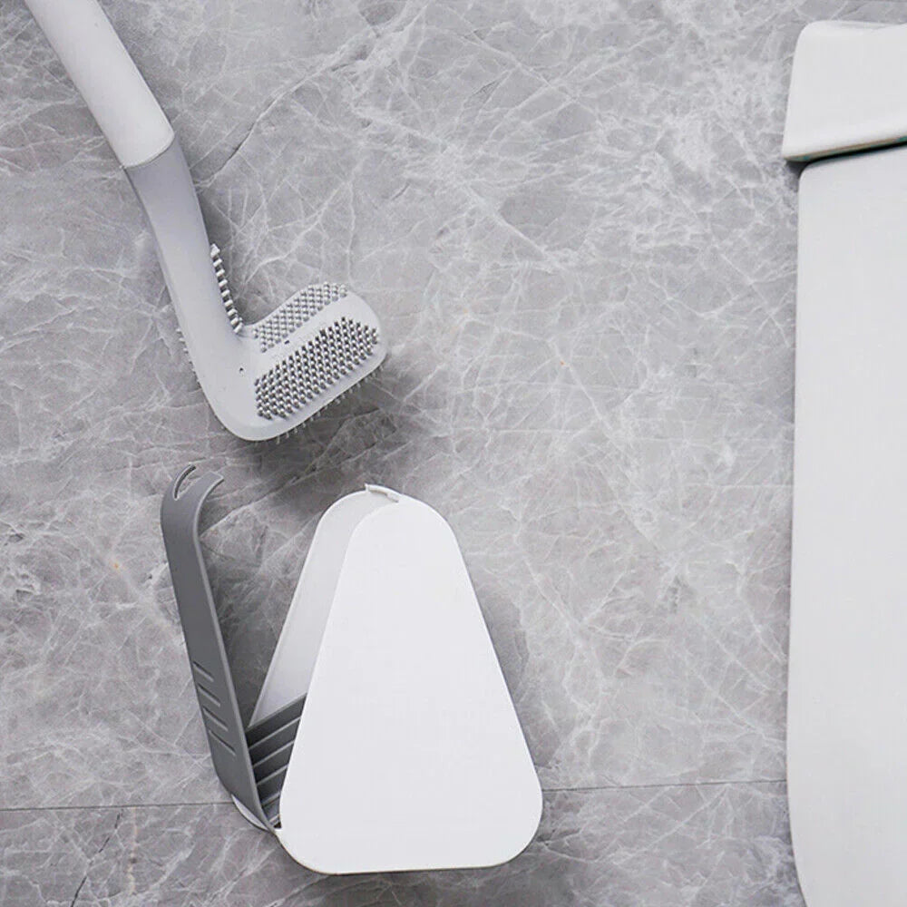 WC-Bürste mit stilvollem Wandhalter, ideal für platzsparende und gründliche Reinigung.