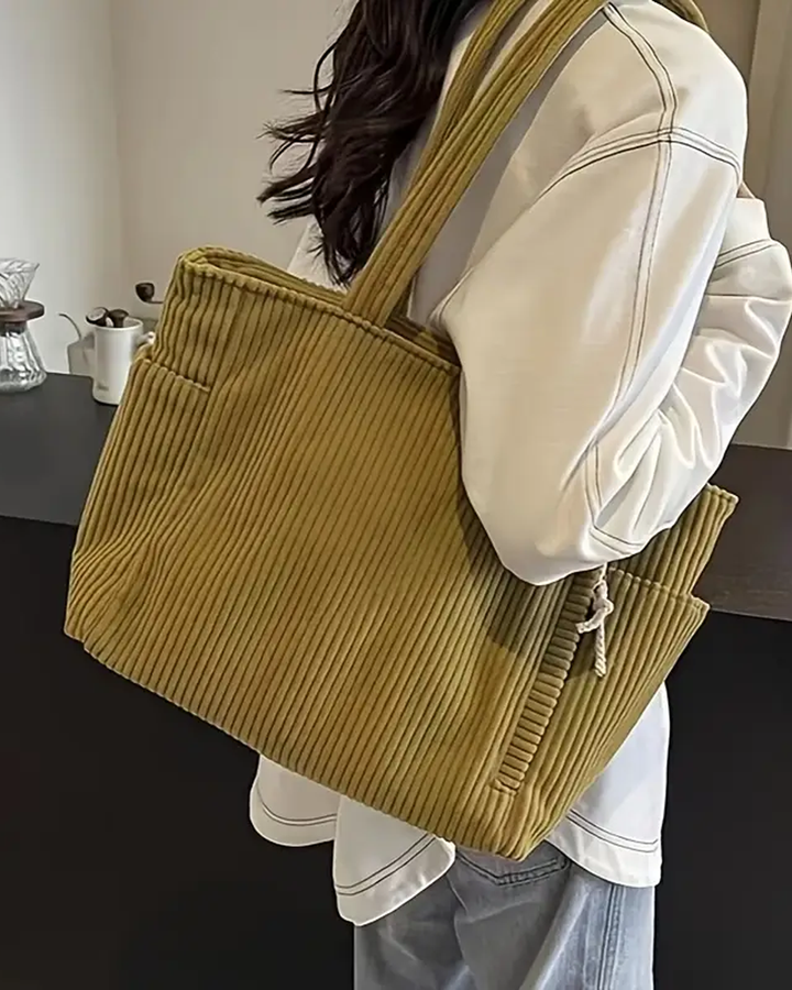 Modische gerippte Damentasche mit Kordel-Design. Tragbar als Umhängetasche oder bequeme Schultertasche.