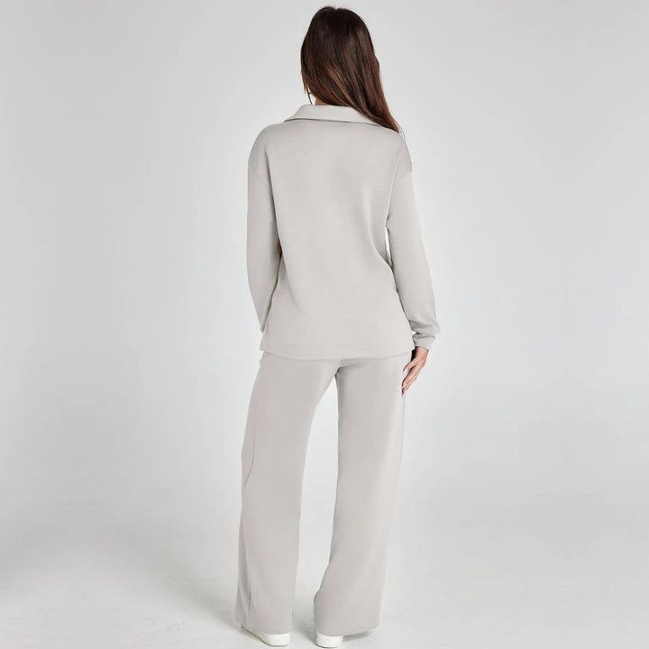 Moderner Damen Zweiteiler: V-Ausschnitt Pullover & weite Hose für stilvolle Alltagskleidung.