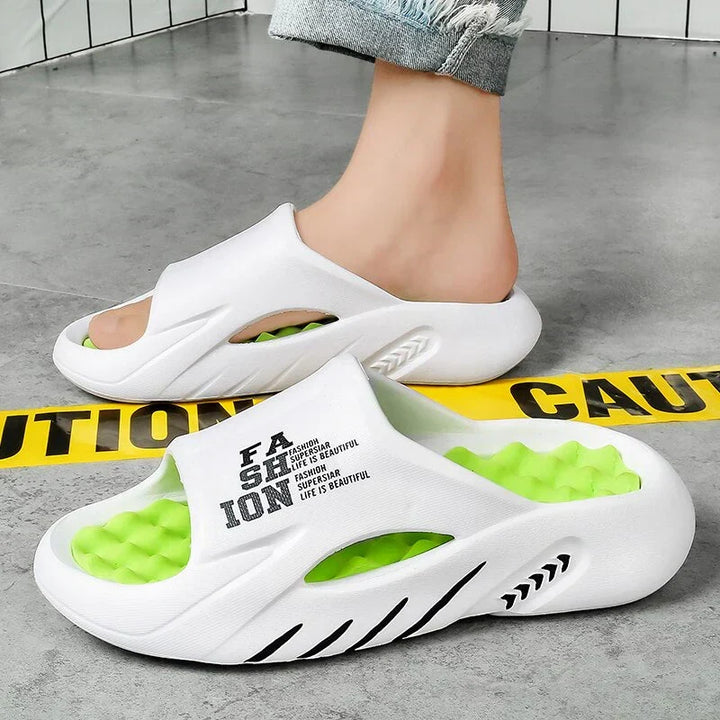 Orthopädische unisex Massageslipper mit ergonomischer Fußgewölbestütze und Massagenoppen.