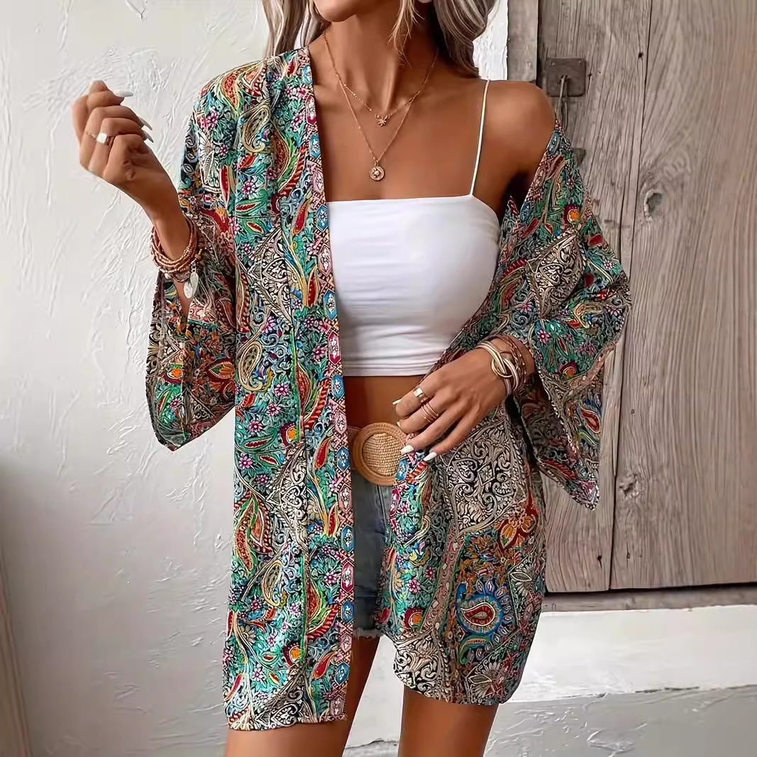 Elegante Damenbluse im Kimono-Stil mit farbigem Ethnomuster, Rundhals und langen Ärmeln. Perfekt für Frühling & Herbst.