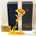 Goldene Blume+LOVE Sockel Schwarze Box