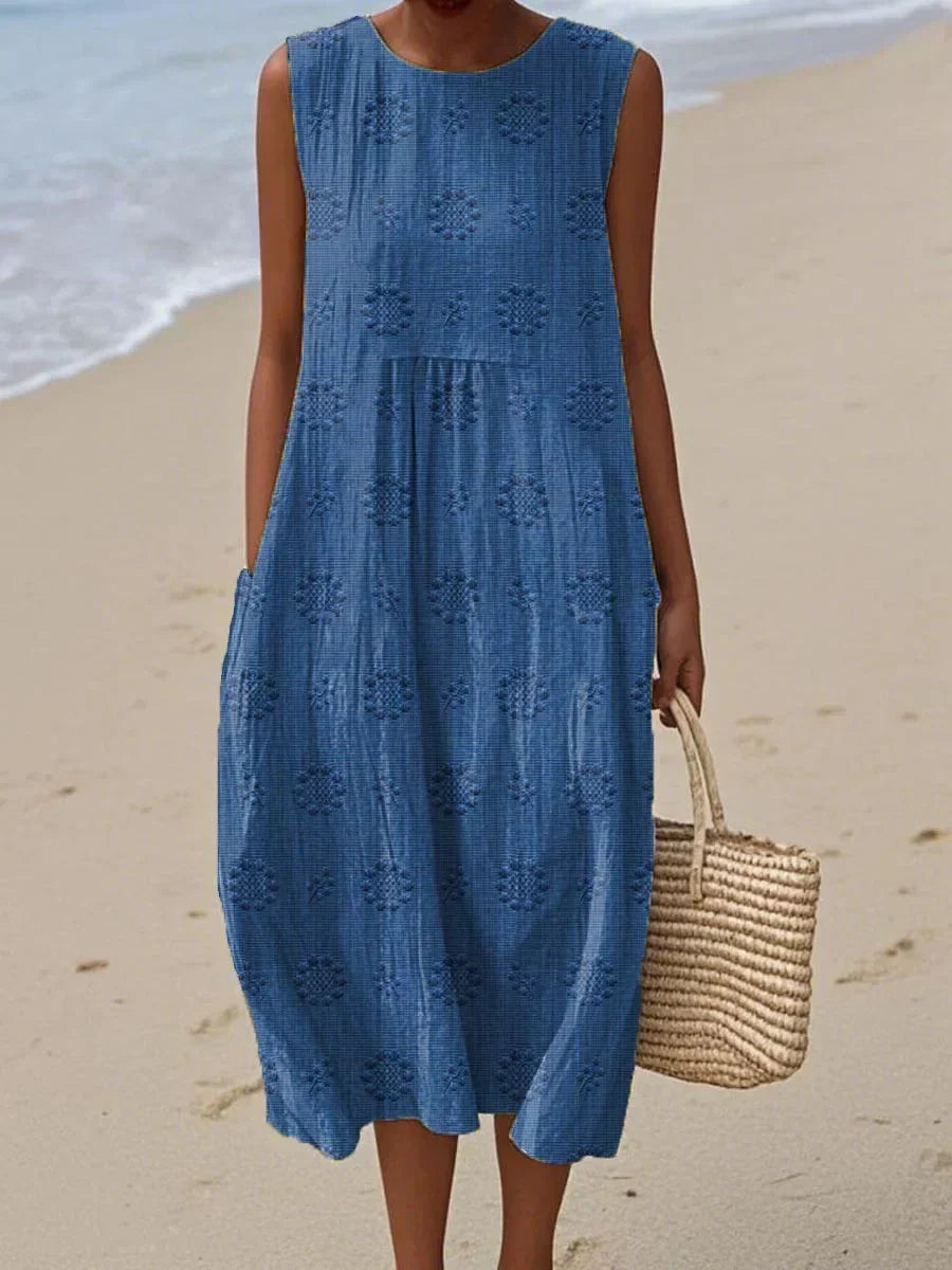 Elegantes Damen Midikleid, ärmellos, mit Struktur & Taschen, perfekt als Sommer- oder Urlaubskleid.