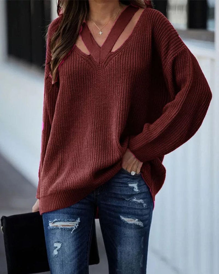 Damen Oberteil mit elegantem V-Ausschnitt. Langer Pullover für stilvollen Komfort im Herbst.