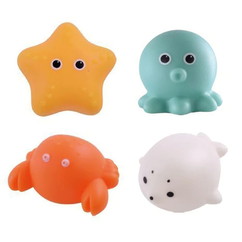 Fröhliches Baden mit dem Funkelnde Badefreunde Set Theodore, einem farbenfrohen LED-Badespielzeug für Kinder.