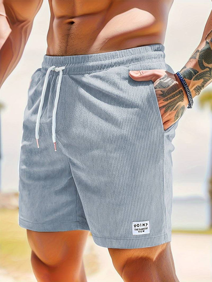 Schnelltrocknende, bunte Männer Sommershorts, perfekt als Strandshorts und für Sport.