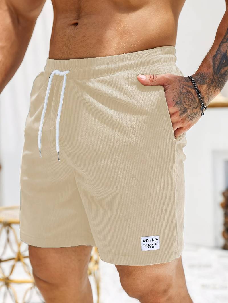 Stylische Männer Sportshorts in Grün, geeignet als Badeshorts oder bequeme Kurze Hose für den Urlaub.