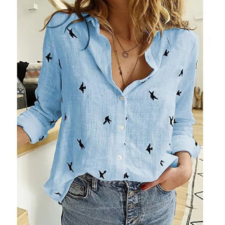 Stilvolle Damen Sommerbluse mit charmantem Vogelmotiv, luftig & bequem, locker sitzendes Oberteil.