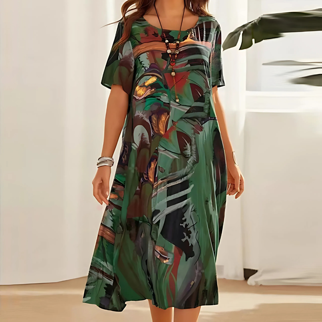 Buntes abstraktes Damen Sommerkleid mit floralem Print, fließend geschnitten, elegant und vielseitig für Freizeit.