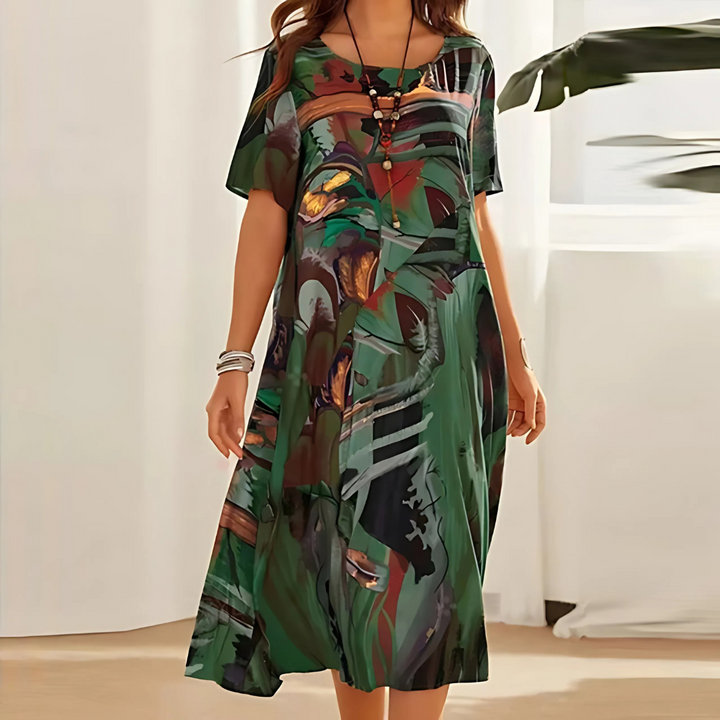 Buntes abstraktes Damen Sommerkleid mit floralem Print, fließend geschnitten, elegant und vielseitig für Freizeit.