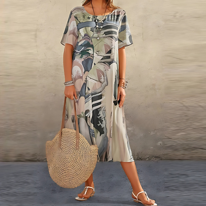 Bequemes, fließendes Damen Freizeitkleid mit buntem abstraktem Blumenprint, Midi-Länge, perfekt als Sommerkleid.