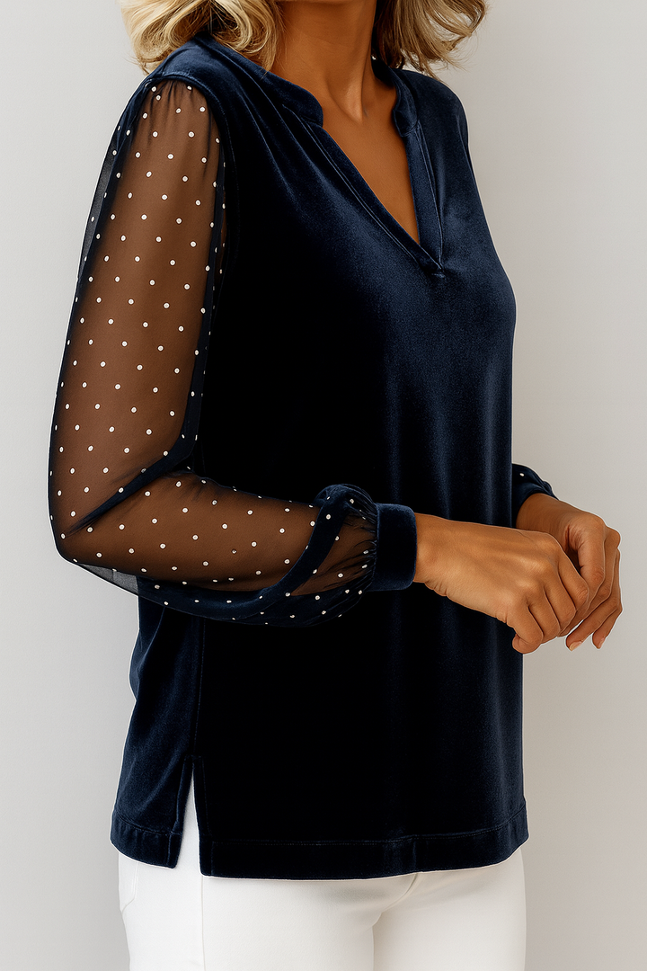 Feminine Langarmbluse für Damen, marineblau, mit eleganten Punktärmeln & ansprechendem Ausschnitt.