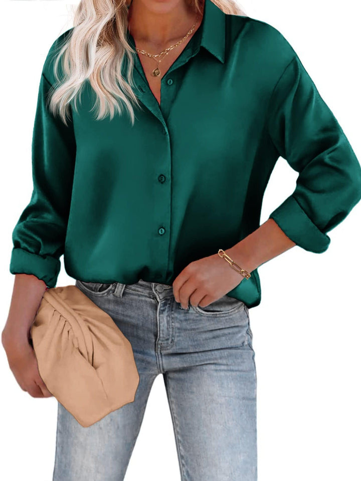 Luxuriöse Damen Bluse mit edlem Glanz. Vielseitige Langarm Bluse mit Reverskragen für Business & Alltag.