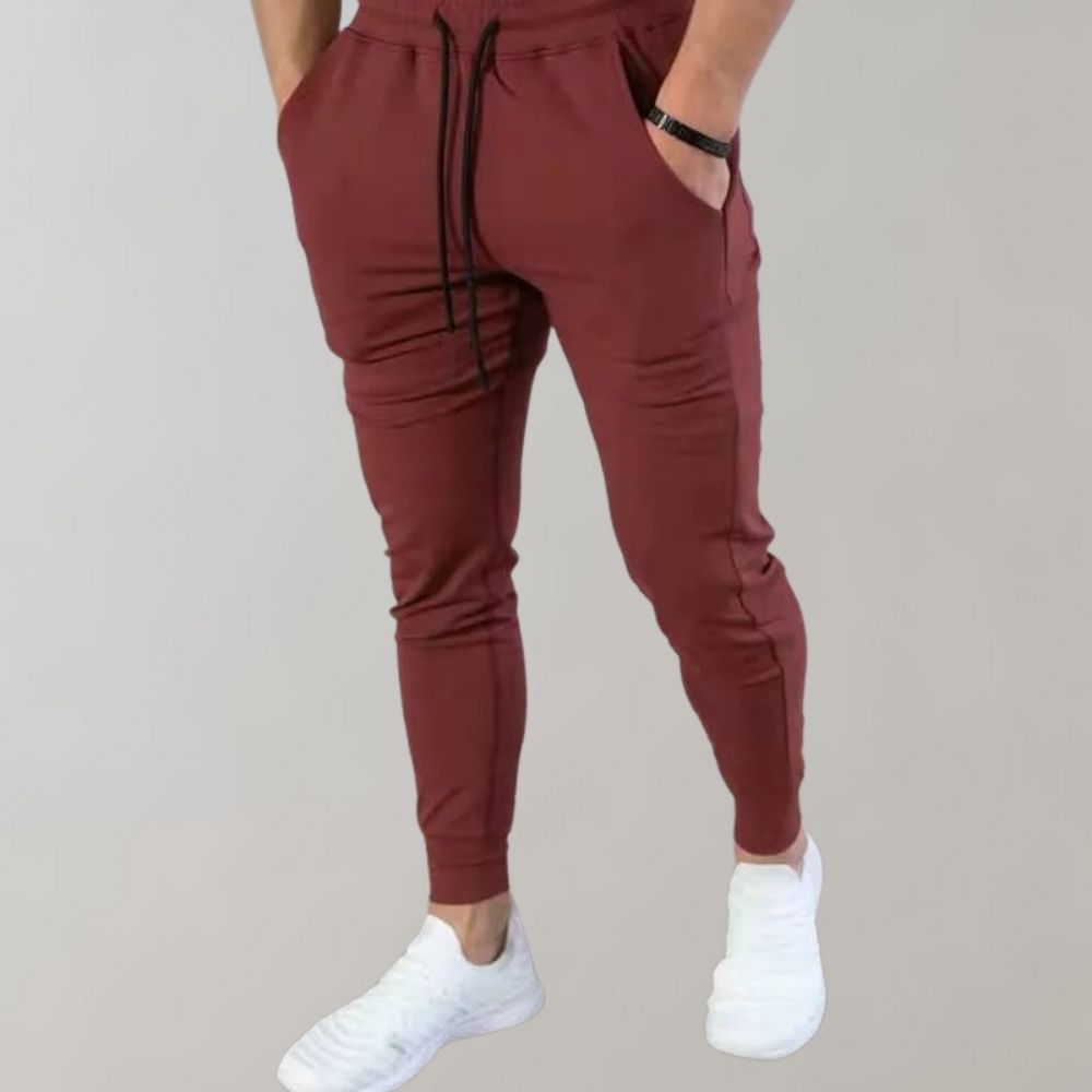 Stylische blaue Herren Slim Fit Jogginghose, ideal als Sporthose oder komfortable Freizeithose für Männer.