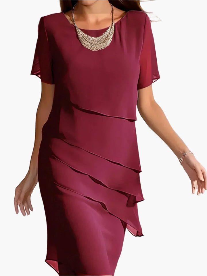 Festliches Cocktailkleid für Damen mit asymmetrischem Stufen-Design, erhältlich in Blau, Rot, Grün oder Khaki.