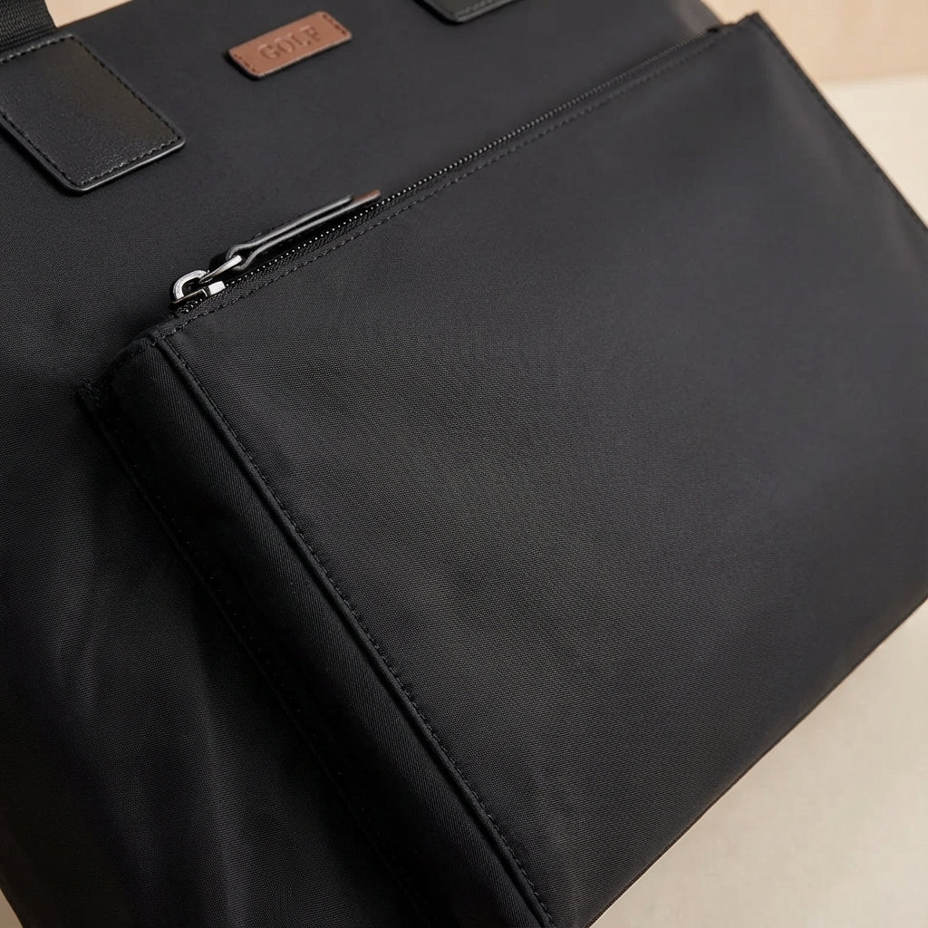 Stilvolle graue Canvas Aktentasche für Laptops, robust & funktional, ideal für den täglichen Arbeitsweg und Reisen.