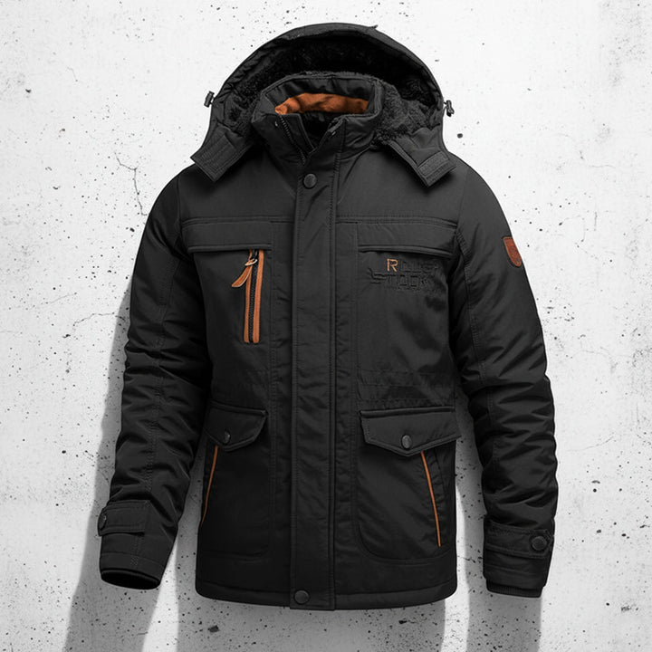 Detail des wasserabweisenden Materials am Herren Winterparka, schützt zuverlässig vor Nässe & Wind.