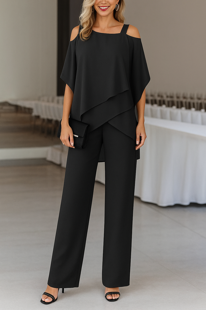 Stilvoller weißer Damen Overall mit fließendem weitem Bein und Taillengürtel für Sommer-Events oder Freizeit.