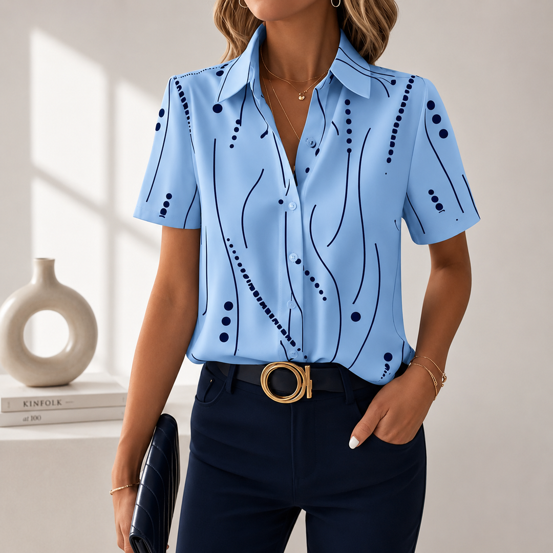 Moderne Damenbluse mit leuchtendem abstraktem Muster. Komfortable lockere Passform, ideal für Frühling/Sommer.