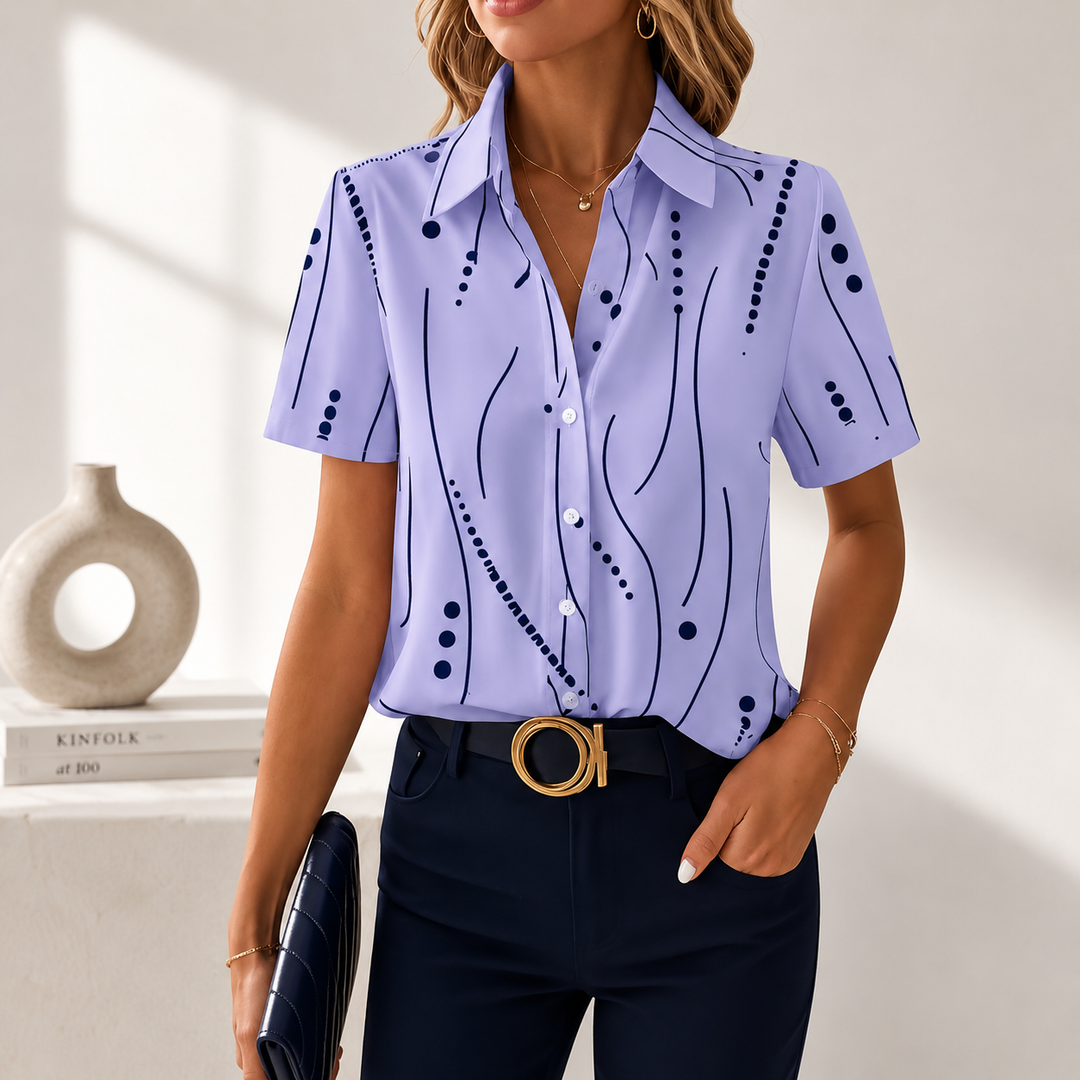 Stilvolle Damenbluse mit abstraktem Muster & durchgehender Knopfleiste. Bequeme lockere Passform.