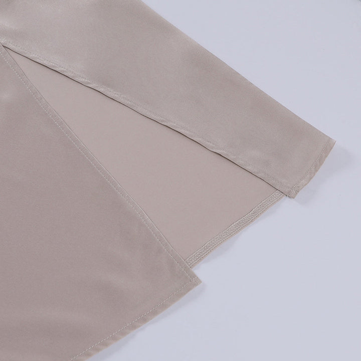 Festliches Elara Midikleid für Damen, mit zarten Spaghettiträgern und rückenfreiem Design.