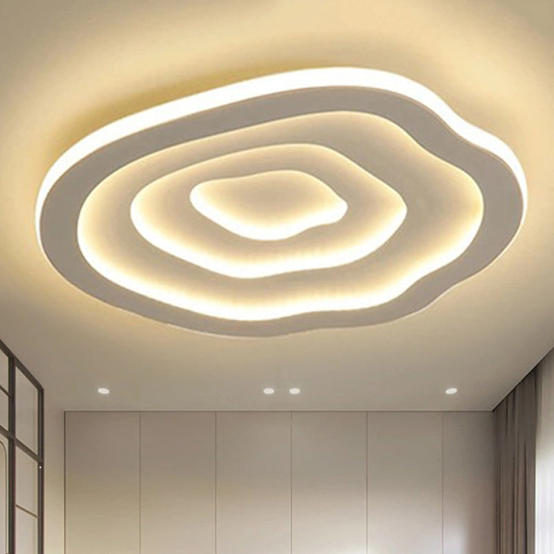 Stilvolle Acryl LED-Deckenleuchte Auralis mit anpassbarem warm-weißem Licht für moderne Räume.
