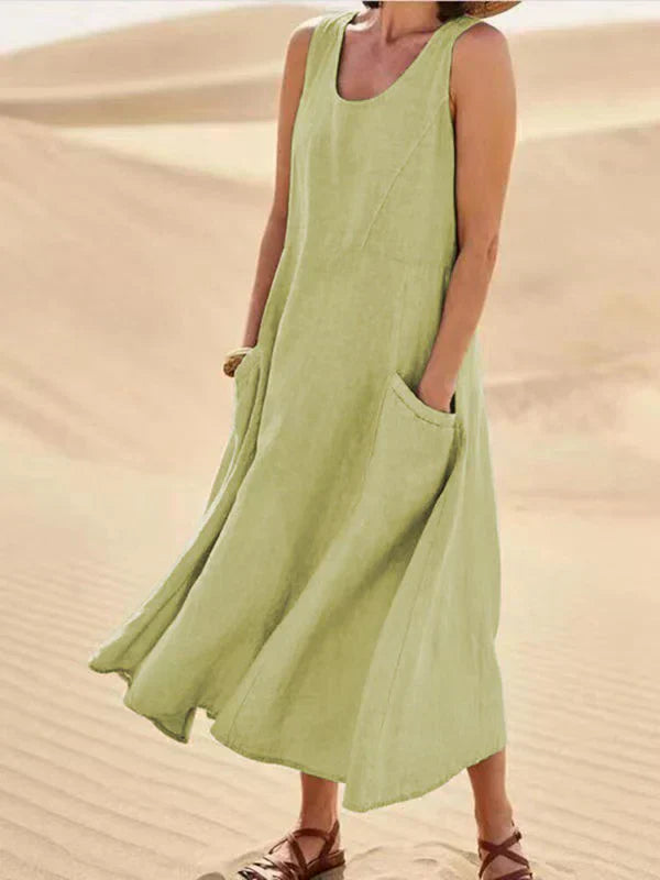 Freizeitliches Damen Sommerkleid in Leinenoptik, ärmellos, Midilänge, mit praktischen Seitentaschen.