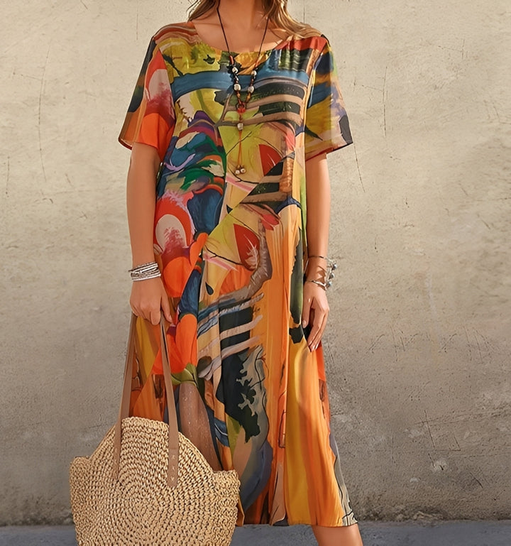 Modisches Damen Relaxed Fit Midikleid mit Statement-Allover-Print. Lässiges Kurzarm Sommerkleid, perfekt für Freizeit.