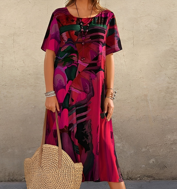 Bequemes Damen Relaxed Fit Kleid mit einzigartigem Statement-Print. Lässiges Kurzarm Freizeitkleid, knielang, Rundhals.