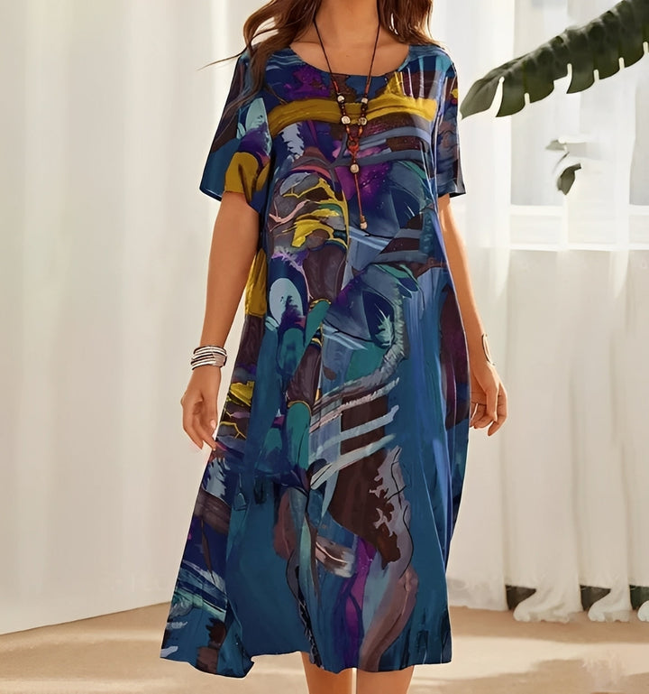 Damen Relaxed Fit Kleid mit Statement-Print. Lässiges Kurzarm Midikleid mit Rundhals, knielang und komfortabel.