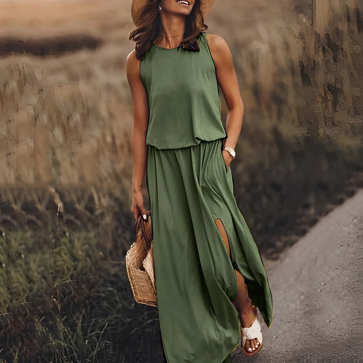 Dunkelgrünes Damen Maxikleid mit ansprechendem Retro-Muster, leicht und elegant für den Sommer.