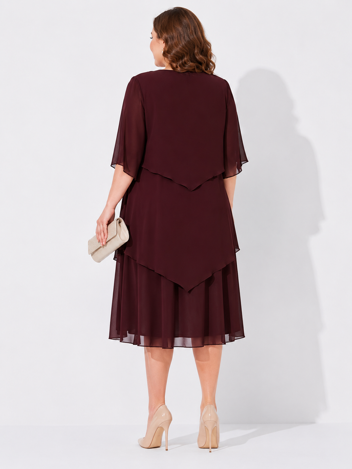 Damenkleid, elegantes Lagenkleid für Abend und Party. Festliche Damenmode, auch als Plus Size Kleid verfügbar.