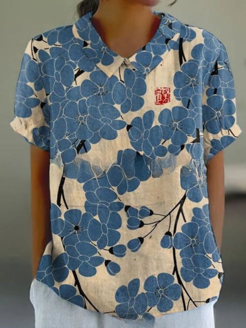 Legere Damen Sommerbluse, Langarm, mit hellem Blumendruck, ideal für entspannte Tage.