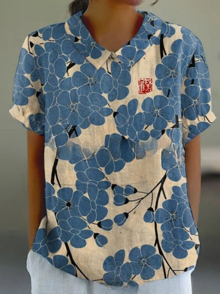 Legere Damen Sommerbluse, Langarm, mit hellem Blumendruck, ideal für entspannte Tage.